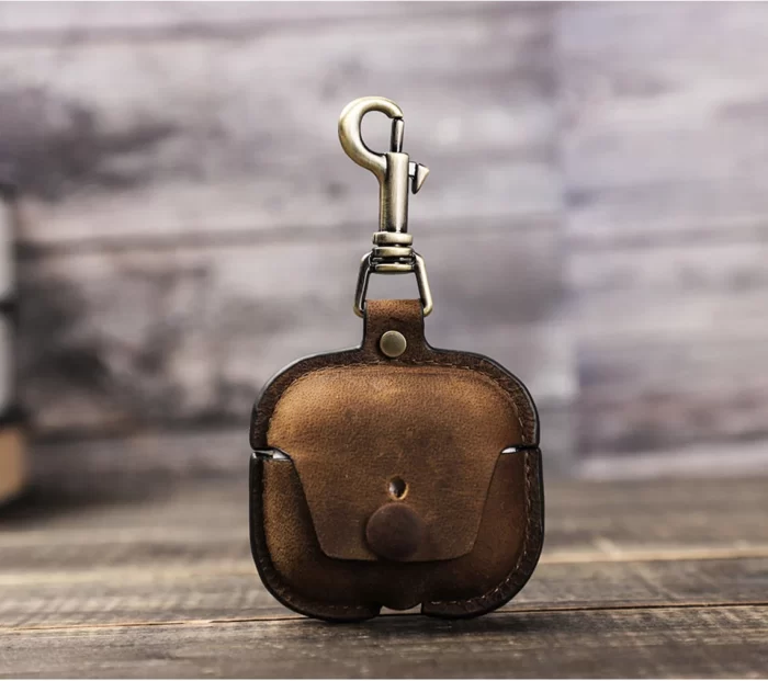 Elevate the safety and style of your AirPod Pro and AirPod 3 with our Genuine Leather Cases. These cases are like cozy homes for your AirPods, crafted from real, high-quality leather that's both strong and super good-looking. They fit your AirPods just right, protecting them from little bumps and scratches while showing off a classic charm. With their soft feel, the leather gets even cooler as time passes, sort of like a special memory book.